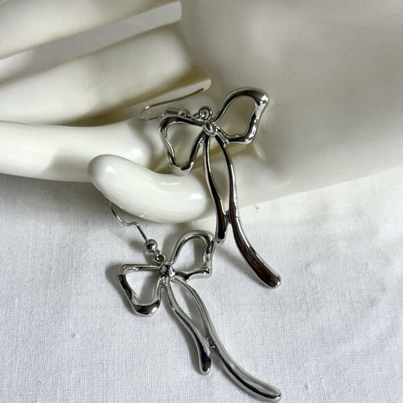 Silver Tone Ribbon Bow Dangle Earrings - Picture 2 of 8